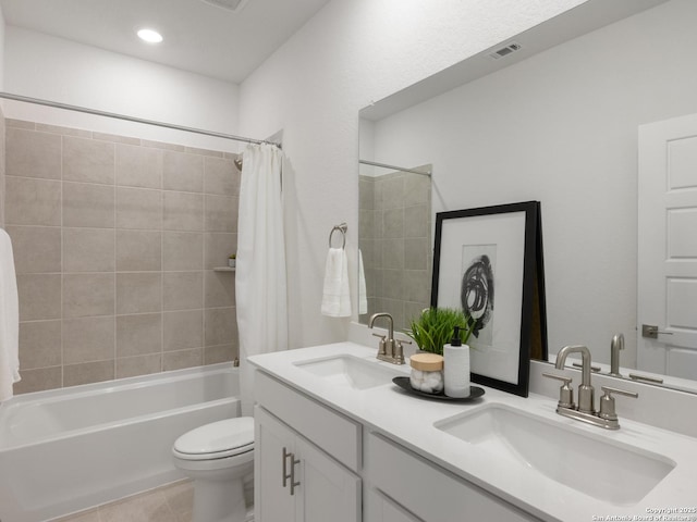 full bathroom with tile patterned flooring, vanity, toilet, and shower / tub combo with curtain