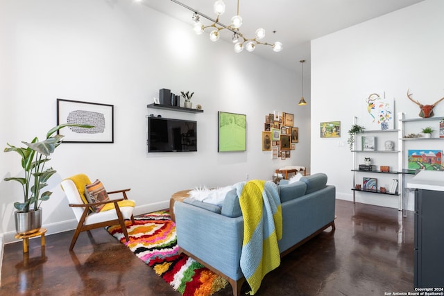 living room featuring a notable chandelier