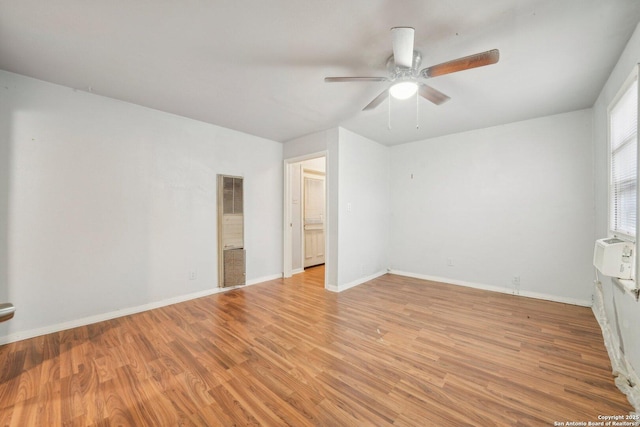 unfurnished room featuring light hardwood / wood-style flooring and ceiling fan