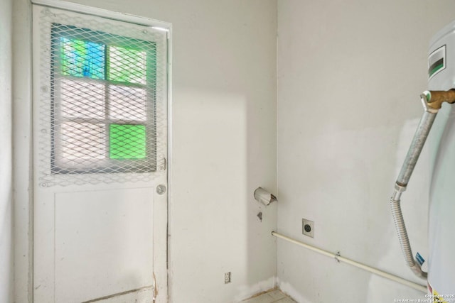 clothes washing area with hookup for an electric dryer