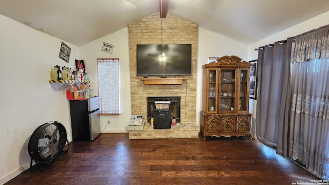 living room featuring a wood stove, lofted ceiling with beams, and dark wood-type flooring