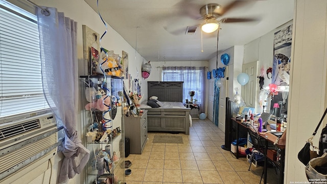 kitchen with ceiling fan and light tile patterned flooring