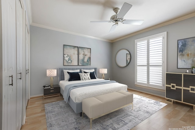 bedroom with hardwood / wood-style flooring, ceiling fan, and ornamental molding