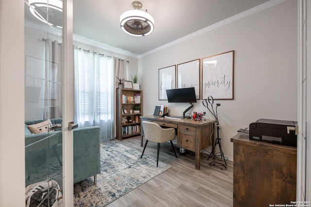 office area with crown molding, french doors, and light wood-type flooring