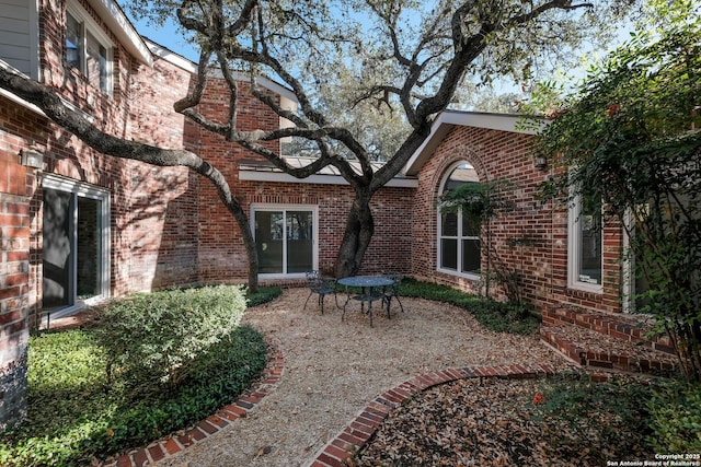 rear view of property with a patio area