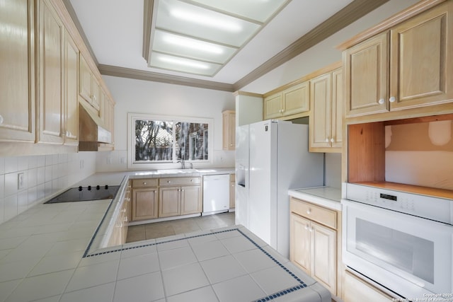 kitchen featuring light brown cabinets, white appliances, sink, crown molding, and decorative backsplash