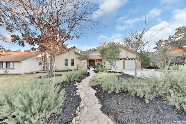 single story home with a garage