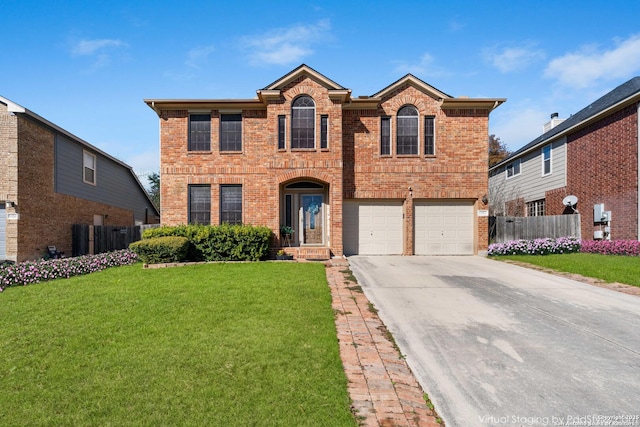 view of front of home featuring a front yard and a garage