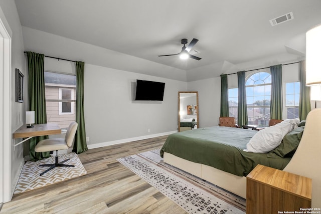 bedroom featuring ceiling fan and wood-type flooring