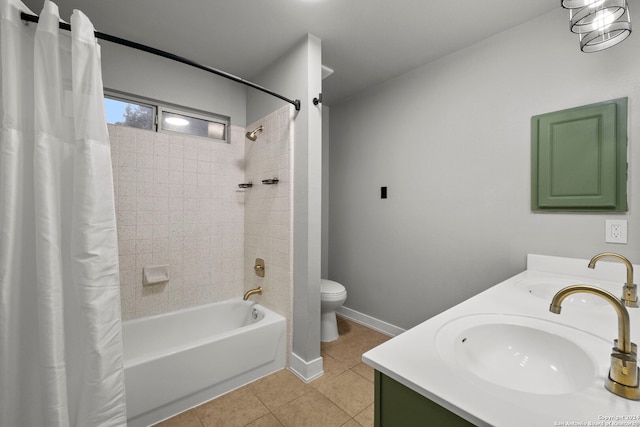 full bathroom with toilet, tile patterned flooring, shower / tub combo, and vanity