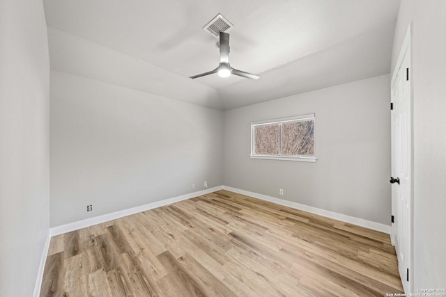 unfurnished room with ceiling fan and hardwood / wood-style floors