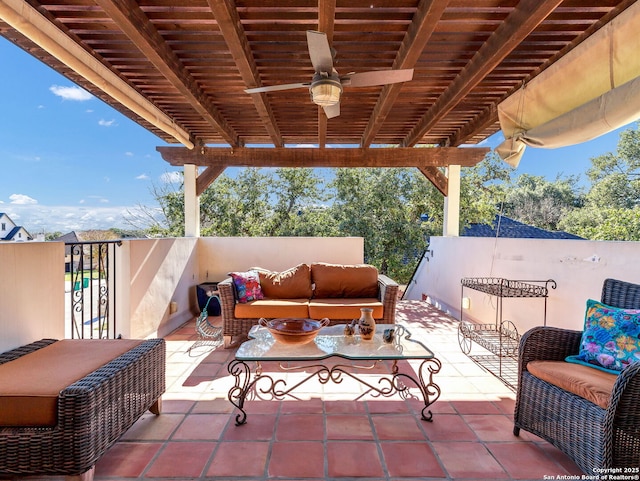 view of patio / terrace with an outdoor living space and ceiling fan