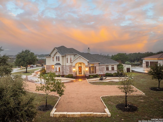 view of front of home with a yard