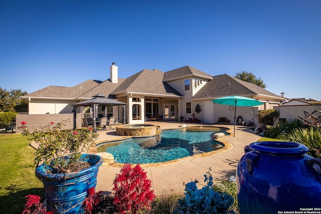 view of pool with a gazebo, an in ground hot tub, and a patio