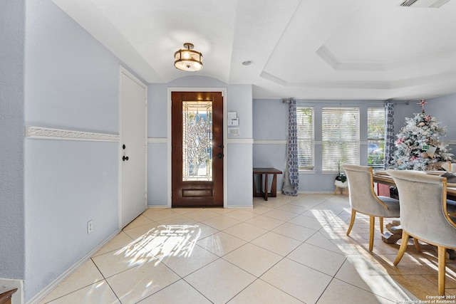 entrance foyer with light tile patterned floors