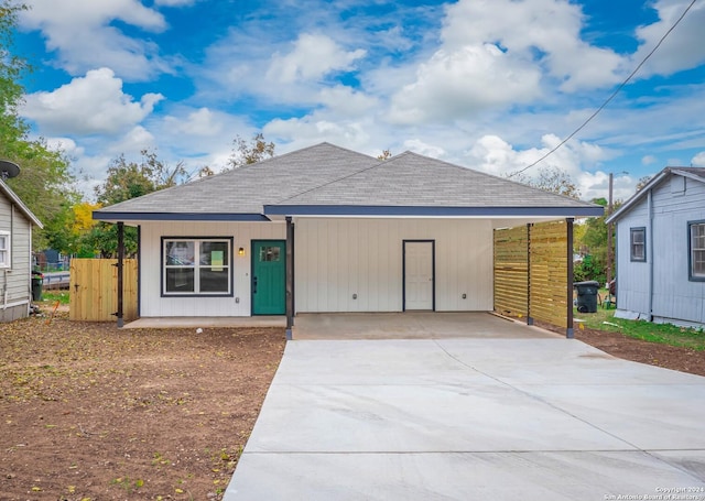 view of front of property with a carport