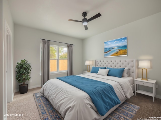 carpeted bedroom featuring ceiling fan