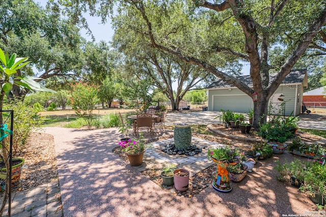 view of patio featuring a garage