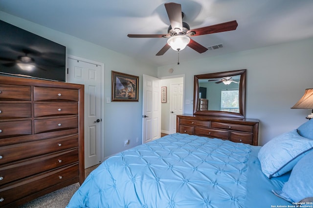 carpeted bedroom featuring ceiling fan