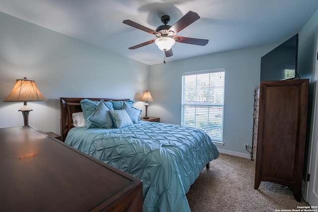 bedroom featuring ceiling fan and carpet floors