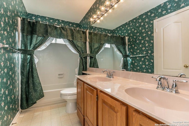 full bathroom with vanity, toilet, and shower / bath combo with shower curtain