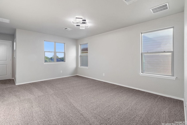 view of carpeted spare room