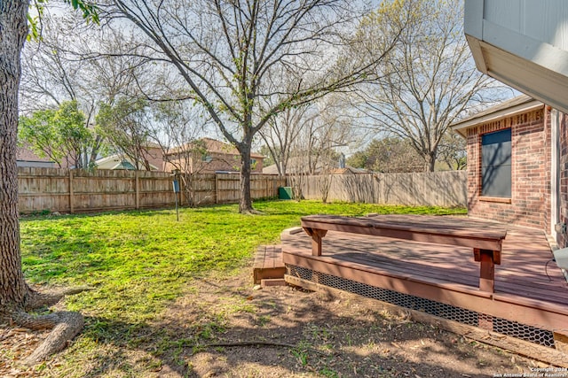 view of yard with a deck