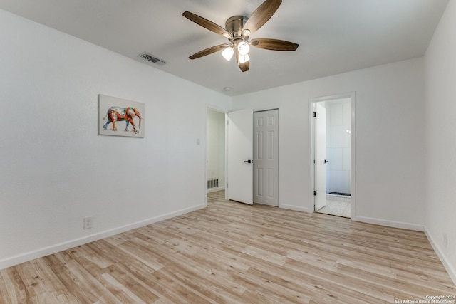 unfurnished bedroom featuring light hardwood / wood-style floors and ceiling fan