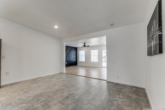 spare room featuring ceiling fan