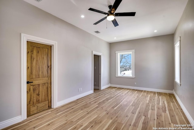 unfurnished bedroom with light hardwood / wood-style floors and ceiling fan