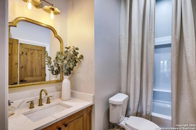 full bathroom with vanity, toilet, and shower / tub combo with curtain