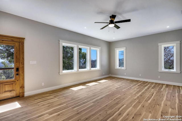 interior space featuring ceiling fan and light hardwood / wood-style floors