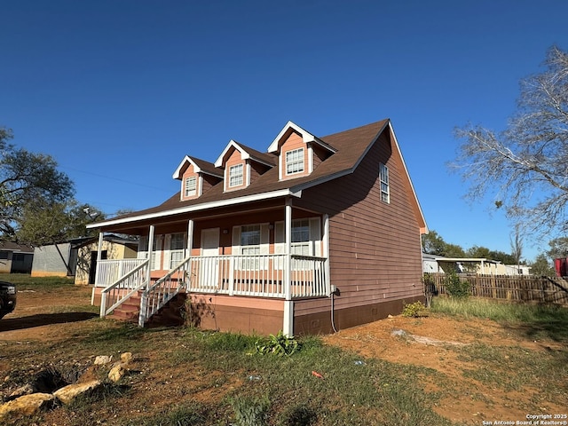 view of front of property featuring covered porch