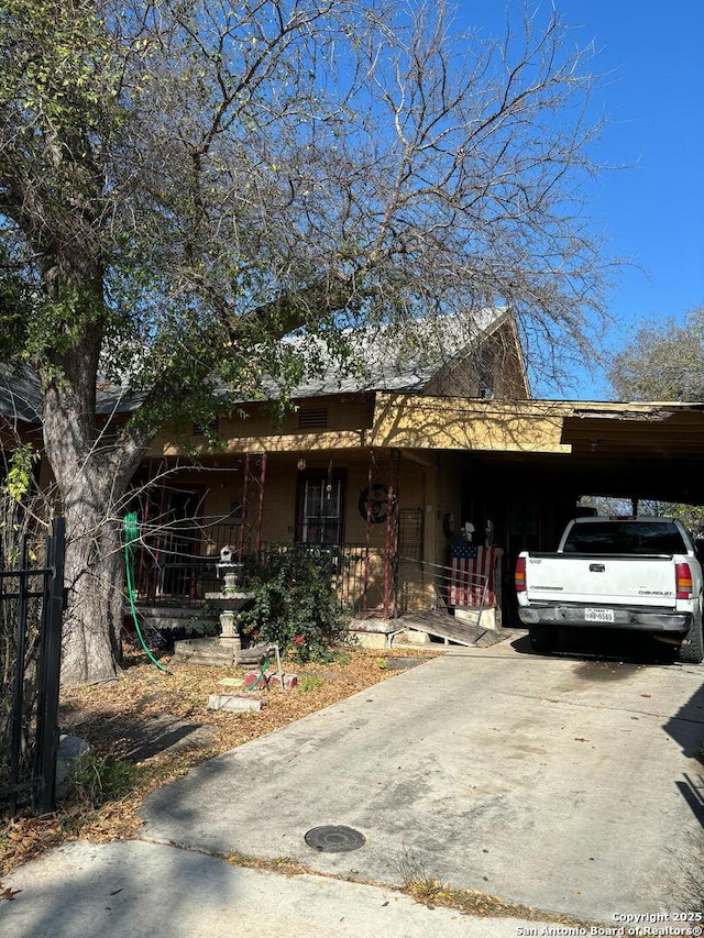 view of front of house with a carport