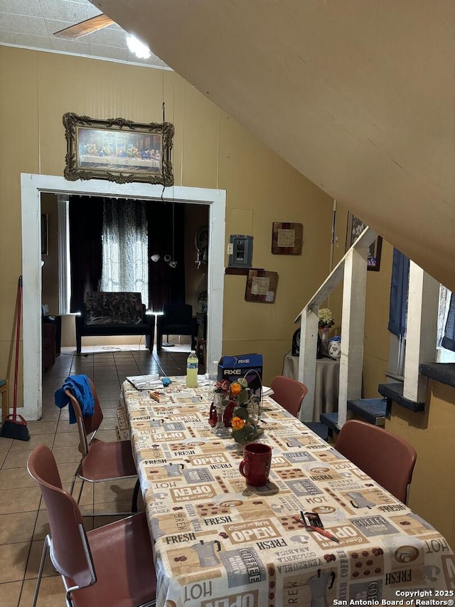 dining space featuring tile patterned floors