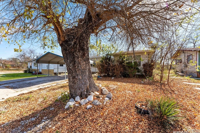 view of front of house with a carport