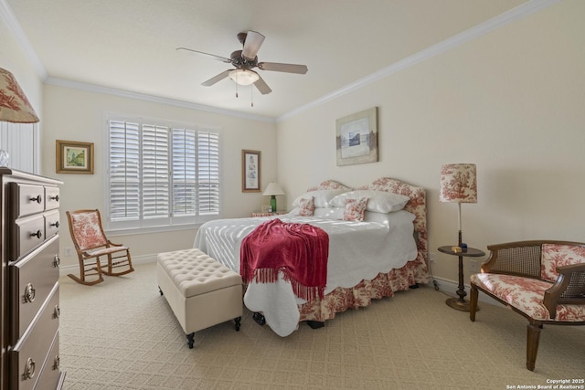 carpeted bedroom featuring ceiling fan and ornamental molding