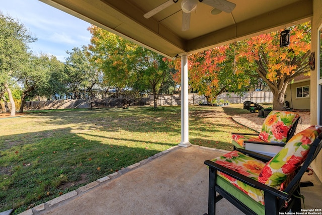 view of patio featuring ceiling fan