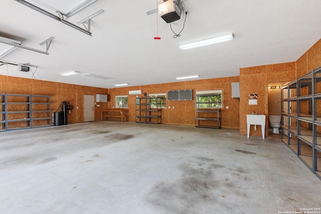 2166 Lightstone, Fredericksburg, TX 78624 - garage featuring a garage door opener