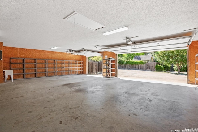 2166 Lightstone, Fredericksburg, TX 78624 - garage featuring a garage door opener