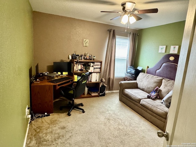 home office featuring carpet and ceiling fan