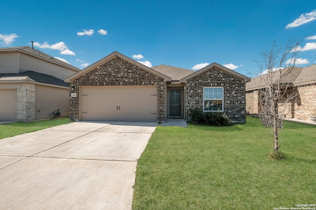 view of front of home featuring a front yard and a garage