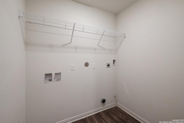 clothes washing area featuring washer hookup, dark hardwood / wood-style flooring, gas dryer hookup, and electric dryer hookup