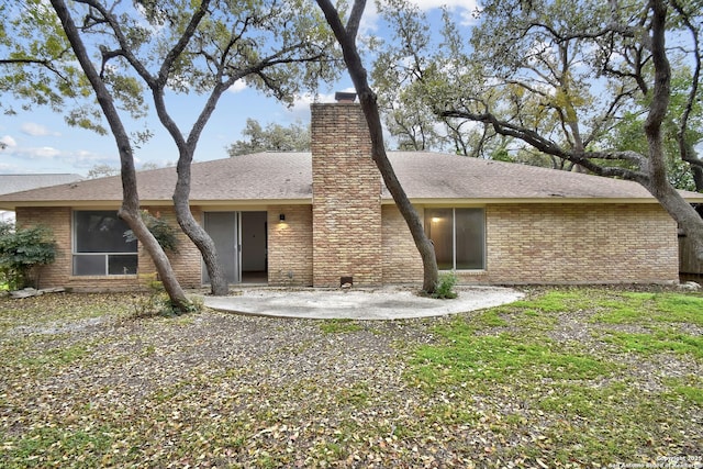 back of house featuring a patio