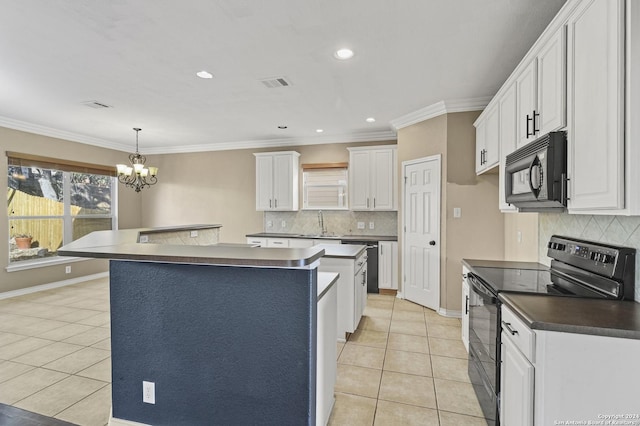 kitchen with white cabinets, light tile patterned floors, a kitchen island, and black appliances