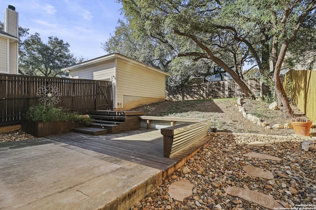 view of yard with a wooden deck