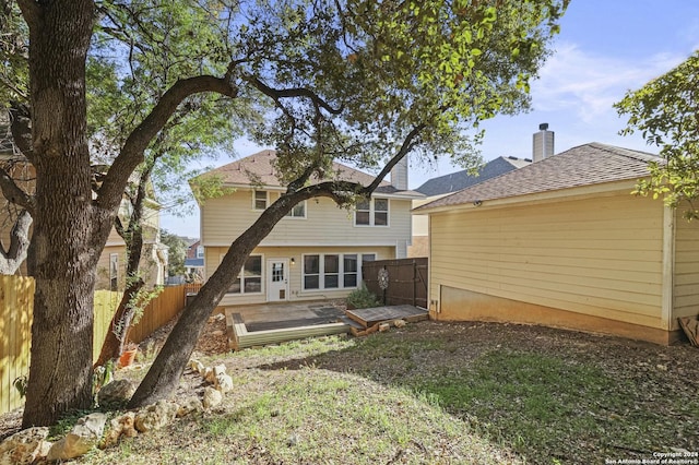 back of house with a patio area