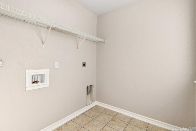 washroom featuring hookup for an electric dryer, tile patterned floors, and hookup for a washing machine