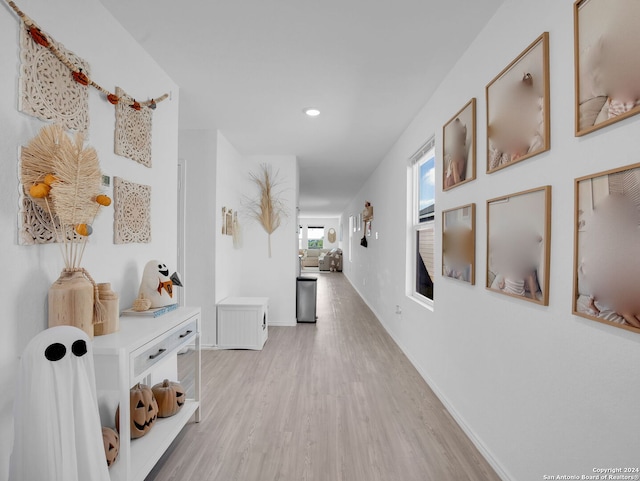 corridor featuring light wood-type flooring