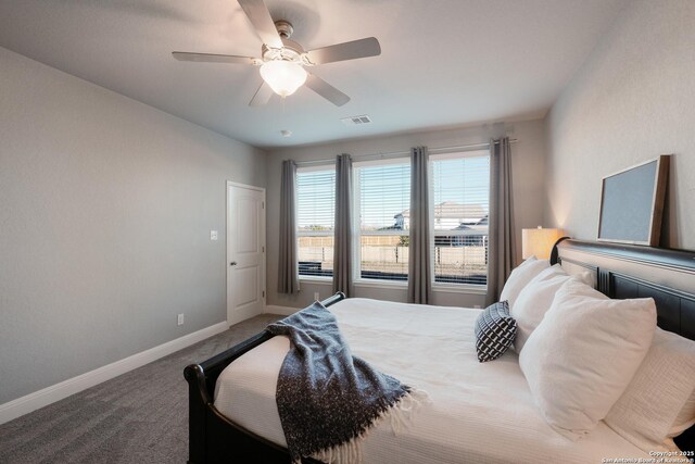 carpeted bedroom with ceiling fan